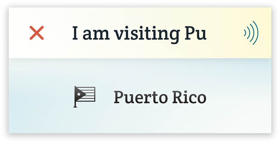 A cropped screenshot of Spoken. The phrase “I am visiting Pu...” is typed into the textbox from Spoken's header. “Puerto Rico” is suggested below. A Puerto Rican flag icon is next to the prediction.