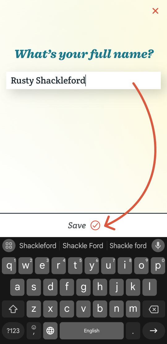 A heading says “What's your full name?” The keyboard is open and someone's first and last names have been typed into the form. An orange arrow points to the save button directly above the keyboard.